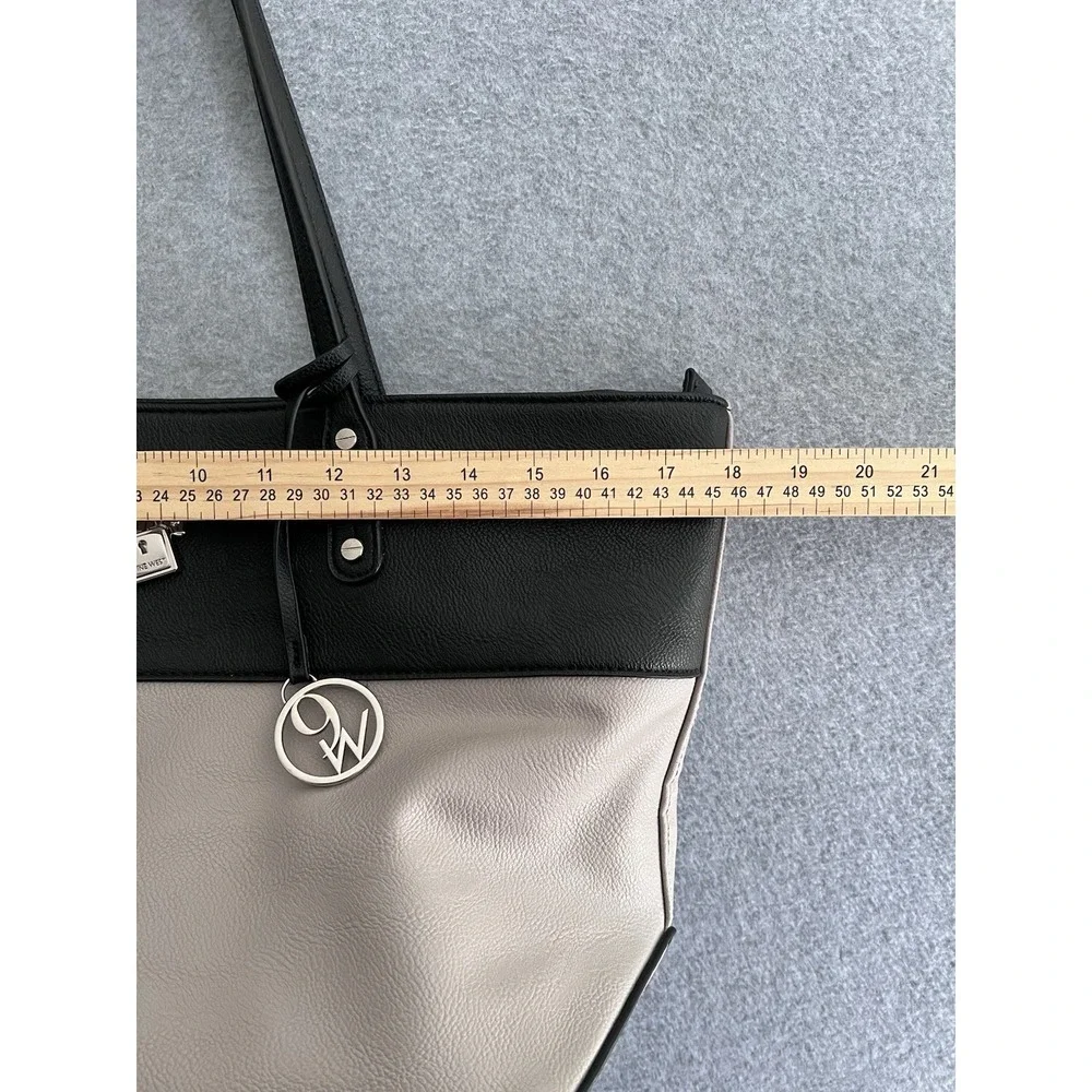 Nine West Handbag PreOwned Condition Black/Beige Padlock Design‎ Faux Leather